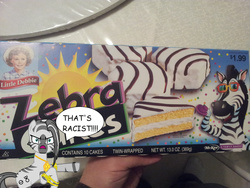 Size: 3264x2448 | Tagged: safe, oc, oc only, oc:chumvi, zebra, angry, bling, cake, food, hand, high res, irl, joke, junk food, little debbie, photo, racism, zebra cakes