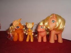 Size: 259x194 | Tagged: safe, applejack, applejack (g1), baby applejack, g1, g3, g4, comparison, generational ponidox, hat, irl, needs more jpeg, photo, picture for breezies, toy