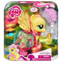 Size: 500x500 | Tagged: safe, fluttershy, rabbit, g4, official, brushable, clothes, comb, dress, fashion style, irl, photo, solo, toy