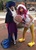 Size: 448x615 | Tagged: safe, artist:sarahndipity cosplay, artist:shelbeanie, pinkie pie, star swirl the bearded, twilight sparkle, human, g4, luna eclipsed, my little pony: friendship is magic, animal costume, chicken pie, chicken suit, clothes, cosplay, costume, irl, irl human, nightmare night, photo, skirt