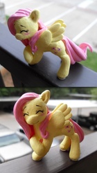 Size: 619x1109 | Tagged: safe, artist:the-kat, fluttershy, g4, blushing, customized toy, cute, depth of field, eyebrows, eyes closed, irl, panels, photo, raised hoof, shyabetes, smiling, solo, toy