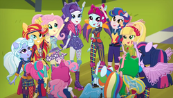 Size: 1079x607 | Tagged: safe, screencap, applejack, fluttershy, indigo zap, lemon zest, pinkie pie, rainbow dash, rarity, sci-twi, sour sweet, sugarcoat, sunny flare, sunset shimmer, twilight sparkle, human, equestria girls, g4, my little pony equestria girls: friendship games, commercial, crystal prep academy, crystal prep shadowbolts, female, group, humane five, humane seven, humane six, ponied up, unleash the magic (commercial), wondercolts