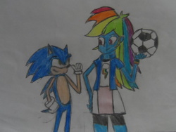 Size: 1024x768 | Tagged: safe, artist:brandonale, rainbow dash, equestria girls, g4, crossover, crossover shipping, female, football, male, shipping, sonic the hedgehog, sonic the hedgehog (series), sonicdash, straight, traditional art