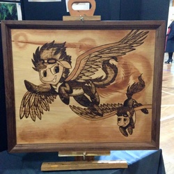 Size: 960x960 | Tagged: safe, artist:hooved-hobbyist, artist:spainfischer, soarin', spitfire, pony, g4, craft, goggles, irl, photo, pyrography, wonderbolts uniform, woodwork