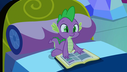 Size: 1280x720 | Tagged: safe, screencap, spike, dragon, do princesses dream of magic sheep, g4, bed, book, comic book, concerned, cute, fangs, male, open mouth, sitting, solo, spikabetes