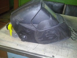 Size: 604x453 | Tagged: safe, butterfly, carving, irl, mask, photo, smiling, welding mask