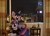 Size: 1507x1080 | Tagged: safe, artist:buttercupbabyppg, artist:plushwaifus, twilight sparkle, pony, unicorn, bronycon, bronycon 2015, g4, armchair, baltimore, bottle, chair, city, clothes, curtains, fedora, hat, horn, indoors, irl, life size, night, photo, plushie, socks, striped socks, tail, window