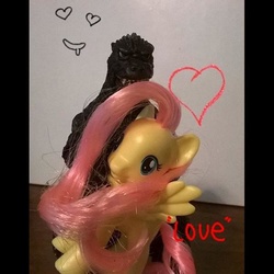 Size: 600x600 | Tagged: safe, fluttershy, kaiju, g4, brushable, female, godzilla, godzilla (series), hug, irl, neca, photo, toy