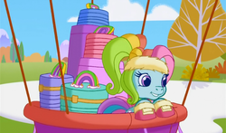 Size: 740x435 | Tagged: safe, screencap, rainbow dash (g3), g3, g3.5, twinkle wish adventure, bag, bags, bandana, clothes, female, hot air balloon, luggage, mittens, smiling, solo