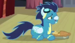 Size: 544x313 | Tagged: safe, screencap, soarin', pegasus, pony, g4, rarity investigates, aweeg*, eating, food, goggles, male, pie, prone, solo, stallion, that pony sure does love pies, wonderbolts uniform