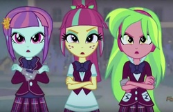 Size: 1049x680 | Tagged: safe, screencap, lemon zest, sour sweet, sunny flare, equestria girls, g4, my little pony equestria girls: friendship games, clothes, crossed arms, skirt, unleash the magic