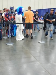 Size: 720x960 | Tagged: safe, artist:atalonthedeer, dj pon-3, vinyl scratch, human, bronycon, bronycon 2015, g4, clothes, cosplay, costume, fursuit, irl, irl human, optimus prime, photo, transformers