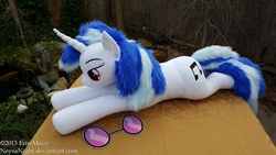 Size: 3264x1836 | Tagged: safe, artist:neysanight, dj pon-3, vinyl scratch, g4, female, glasses, headphones, irl, life size, photo, plushie, prone, red eyes, solo, wrong eye color