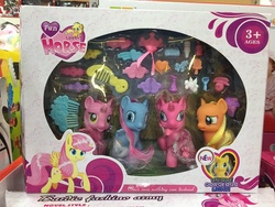 Size: 600x450 | Tagged: safe, applejack, g4, bootleg, chibi, concerned pony, creepy eyes, fun lovely horse, irl, photo, toy