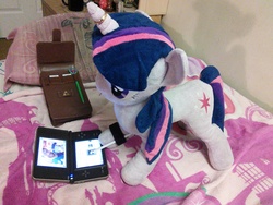 Size: 2592x1944 | Tagged: artist needed, safe, twilight sparkle, human, g4, bed, dsi, glasses, horn, horn ring, irl, irl human, jin, nintendo ds, photo, plushie, the legend of zelda, triforce