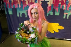 Size: 1024x683 | Tagged: artist needed, safe, fluttershy, human, g4, 2016, clothes, cookie, cosplay, costume, food, irl, irl human, photo, rubronycon, solo