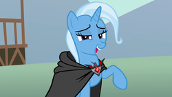 Size: 1280x720 | Tagged: safe, screencap, trixie, pony, g4, magic duel, alicorn amulet, cape, clothes, female, mare, solo