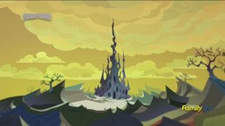Size: 1920x1080 | Tagged: safe, screencap, g4, to where and back again, badlands, bare tree, castle, changeling hive, changeling kingdom, discovery family logo, genius loci, hive, no pony, scenery, spire, tree, yellow sky