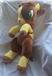 Size: 440x640 | Tagged: safe, artist:klplushies, arizona (tfh), cow, them's fightin' herds, community related, irl, on back, photo, plushie, solo