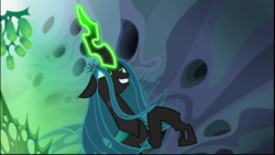 Size: 1024x576 | Tagged: safe, screencap, queen chrysalis, changeling, changeling queen, g4, to where and back again, cocoon, evil smile, female, glowing eyes, glowing horn, grin, horn, rearing, smiling, solo
