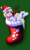 Size: 1161x1920 | Tagged: safe, artist:fatcakes, derpy hooves, pegasus, pony, g4, candy, candy cane, christmas, christmas lights, christmas stocking, female, food, hat, mare, santa hat, sock, solo, tongue out