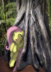 Size: 1008x1400 | Tagged: safe, artist:riniginianna, fluttershy, g4, eyes closed, happy, irl, joke, kentucky, photo, ponies in real life, shadow, solo, tree, vector