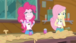 Size: 1187x675 | Tagged: safe, screencap, fluttershy, pinkie pie, equestria girls, g4, legend of everfree - bloopers, my little pony equestria girls: legend of everfree, clothes, dough, faic, female, food, grin, needs more jpeg, sleeveless, smiling, sprinkles, tank top, wat, wtf