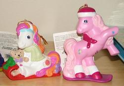 Size: 680x476 | Tagged: safe, photographer:tradertif, pinkie pie (g3), sunny daze (g3), g3, christmas, clothes, earmuffs, irl, merchandise, ornament, ornaments, photo, scarf, sled, snowboard, snowboarding, teddy bear
