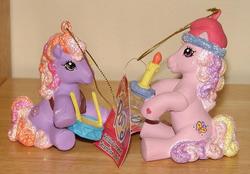 Size: 706x492 | Tagged: safe, photographer:tradertif, fluttershy (g3), twinkle twirl, g3, candle, christmas, drums, irl, merchandise, musical instrument, my little pony logo, ornament, ornaments, photo