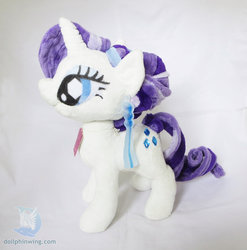 Size: 1024x1038 | Tagged: safe, artist:dollphinwing, rarity, crystal pony, pony, g4, the crystal empire, ear piercing, earring, female, irl, jewelry, photo, piercing, plushie, solo
