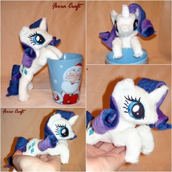 Size: 1002x1002 | Tagged: safe, artist:ferracraft, rarity, g4, cup, hand, irl, mini, photo, plushie, prone, solo