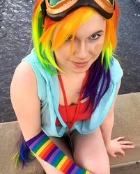 Size: 1213x1512 | Tagged: safe, artist:alvrexadpot, rainbow dash, human, g4, arm warmers, bandage, clothes, cosplay, costume, goggles, hoodie, irl, irl human, nekocon, photo, solo, tail, water, wig