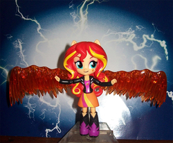 Size: 1032x850 | Tagged: safe, sunset shimmer, equestria girls, g4, boots, clothes, doll, equestria girls minis, fiery wings, irl, jacket, leather jacket, photo, skirt, solo, sunset phoenix, toy