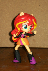 Size: 700x1050 | Tagged: safe, sunset shimmer, equestria girls, g4, boots, clothes, doll, equestria girls minis, eqventures of the minis, female, fighting stance, jacket, leather jacket, pony ears, skirt, solo, toy