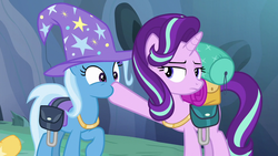 Size: 1280x720 | Tagged: safe, screencap, starlight glimmer, trixie, pony, g4, to where and back again, hoof in mouth, jewelry, necklace, saddle bag, trixie's hat