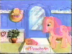Size: 334x251 | Tagged: safe, screencap, peachy, twinkles, cat, human, pony, g1, official, advertisement, animated, bow, gif, hat, heart, irl, irl human, photo, playset, tail bow, target demographic, toy, traditional animation
