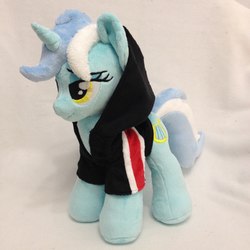 Size: 960x960 | Tagged: safe, artist:burgunzik, lyra heartstrings, pony, unicorn, g4, clothes, hoodie, irl, lidded eyes, photo, plushie, solo