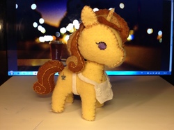 Size: 1280x960 | Tagged: safe, artist:whale, cinnamon chai, pony, unicorn, g4, apron, clothes, doll, irl, photo, plushie, solo, toy