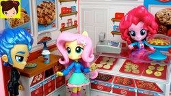 Size: 1280x720 | Tagged: safe, screencap, flash sentry, fluttershy, pinkie pie, equestria girls, g4, animated at source, bakery, clothes, doll, equestria girls minis, eqventures of the minis, food, skirt, toy