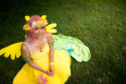 Size: 1024x686 | Tagged: safe, artist:aponevee, fluttershy, human, g4, clothes, cosplay, costume, floral head wreath, flower, irl, irl human, photo, solo