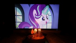 Size: 4128x2322 | Tagged: safe, screencap, starlight glimmer, pony, g4, cake, food, high res, irl, photo, solo, television, waifu dinner