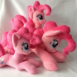 Size: 960x960 | Tagged: safe, artist:burgunzik, pinkie pie, earth pony, pony, g4, female, irl, mare, multeity, photo, pinkie clone, plushie, prone, too much pink energy is dangerous