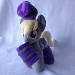 Size: 960x960 | Tagged: safe, artist:burgunzik, derpy hooves, pegasus, pony, g4, clothes, female, irl, mare, photo, plushie, socks, solo, striped socks