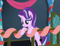 Size: 1057x809 | Tagged: safe, screencap, starlight glimmer, pony, a hearth's warming tail, g4, bipedal, bipedal leaning, female, hearth's warming, leaning, leaning on railings, looking down, mare, railing, solo, twilight's castle