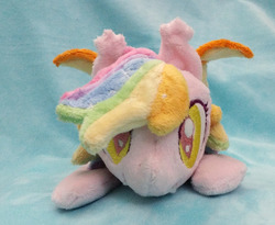 Size: 1280x1049 | Tagged: safe, artist:appledew, oc, oc only, oc:paper stars, bat pony, pony, beanie (plushie), cute, cute little fangs, ear fluff, fangs, irl, looking at you, photo, plushie, smiling, solo, weapons-grade cute