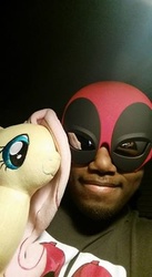 Size: 217x395 | Tagged: safe, artist:onlyfactory, fluttershy, human, g4, bootleg, deadpool, glasses, irl, irl human, photo, plushie