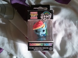 Size: 2592x1944 | Tagged: safe, rainbow dash, rarity, g4, bedsheets, funko, irl, keychain, my little pony logo, photo, pop vinyl, toy