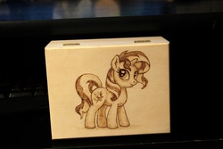 Size: 1280x854 | Tagged: safe, artist:horseez, sunset shimmer, pony, unicorn, g4, backwards cutie mark, box, female, pyrography, solo, woodwork