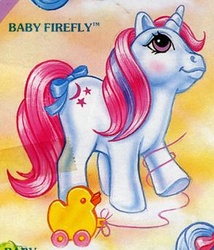 Size: 293x342 | Tagged: safe, photographer:breyer600, baby moondancer, bird, duck, pony, unicorn, g1, official, baby, baby dancerbetes, baby moondancer is a queen, baby pony, blushing, bow, cute, female, filly, foal, smiling, solo, tail, tail bow, toy