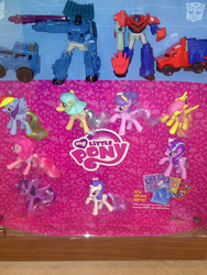 Size: 1344x1792 | Tagged: safe, coco pommel, fluttershy, pinkie pie, rainbow dash, rarity, starlight glimmer, suri polomare, twilight sparkle, alicorn, pony, g4, clash of hasbro's titans, female, mare, mcdonald's happy meal toys, op is a slowpoke, optimus prime, thunderhoof, toy, transformers, transformers robots in disguise (2015), twilight sparkle (alicorn)